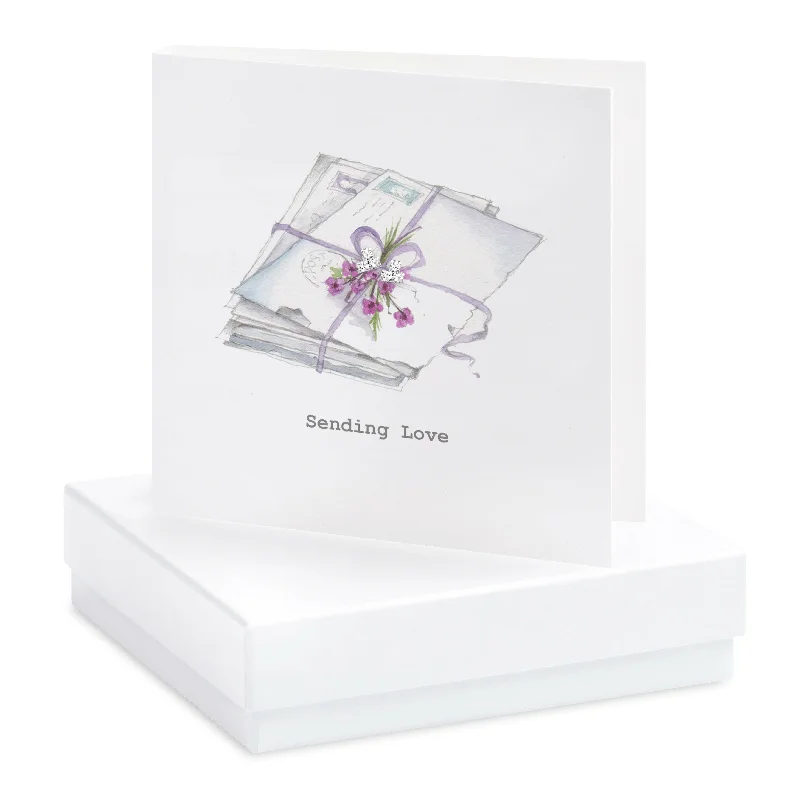 Sterling Silver Crystal Stud Earrings on Greeting Card with a Pile of  Letters